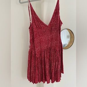 Princess Polly red romper with small white flowers